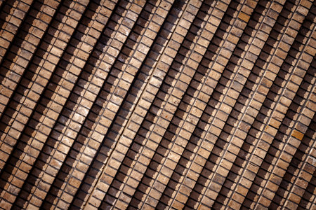 Background of old brown lined brick wall texture, abstract architecture wallpaper.