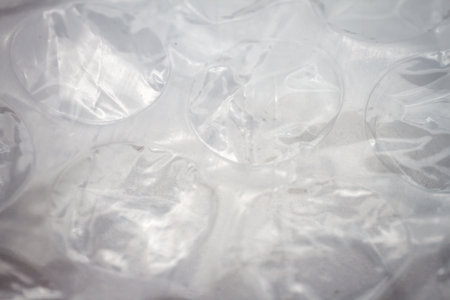 Extreme macro of plastic bubble wrap texture. Selective soft focus, shallow depth of field. Abstract...