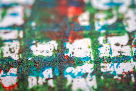 Extreme close up of colorful acrylic paint texture showing brush strokes. Selective focus.の写真素材