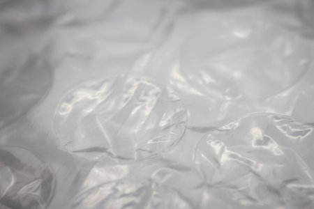 Extreme macro of plastic bubble wrap texture. Selective soft focus, shallow depth of field. Abstract...