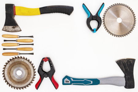 Flat lay of new and used hand tools on white background. Large collection of various tools and bits...