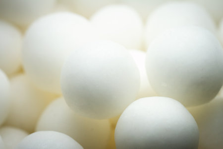 Extreme close up of white small candy balls. Selective soft focus, shallow depth of field.の写真素材