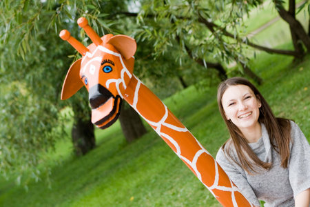 closeup of a brunette in the parkの写真素材