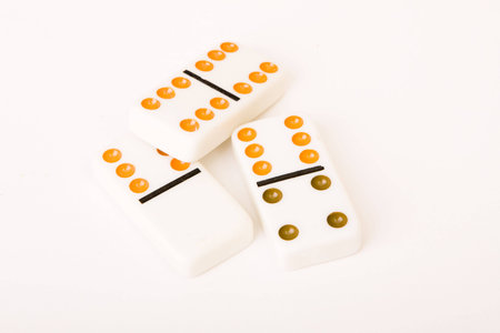 Three domino pieces on isolated white background