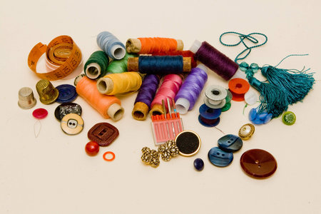 Colorfull tread, buttons and needle