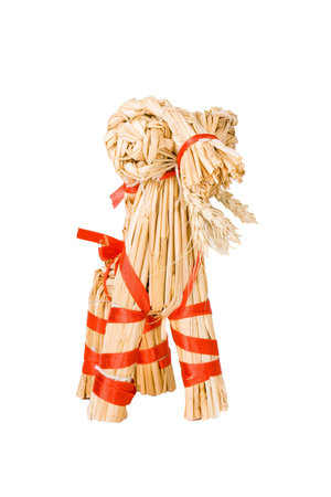 Christmas straw goat on white isolated backgroundの写真素材