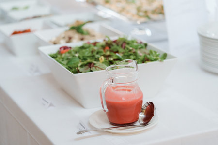 catering buffet food indoor in luxury restaurant with colorful salad and vegetablesの写真素材