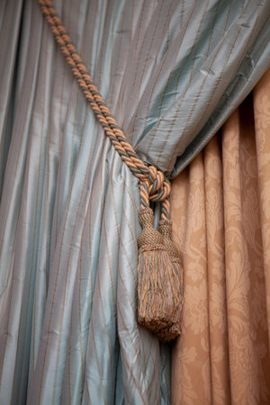 close up of a curtain with a rope.の写真素材