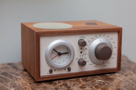 Vintage radio receiver on a marble countertop, close-upの写真素材