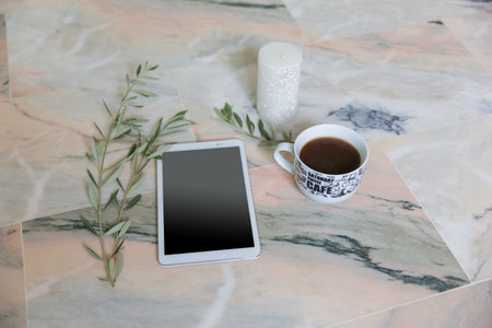 Coffee cup and digital tabletle table, stock photoの写真素材