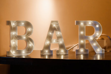 \Decorative letters spelling the word \"\"Bar\"\" on the table\""の写真素材