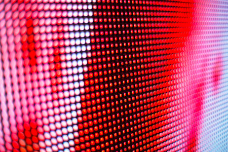 Pink, red and white bright colored LED smd screen - close up backgroundの写真素材