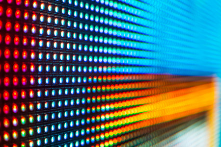 Blue, red and yellow bright colored LED smd screen - grid extreme close up macro background