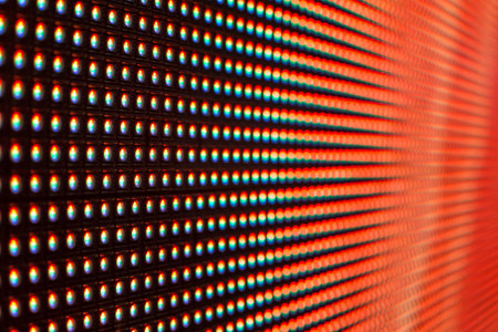 Bright red colored LED smd screen - grid extreme macro backgroundの写真素材