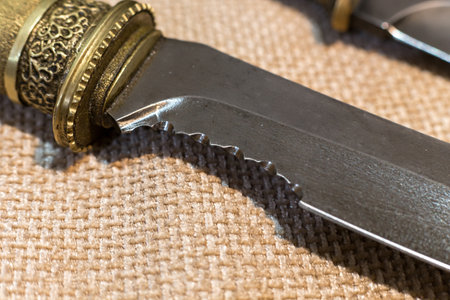 Golden knife handle close up picture