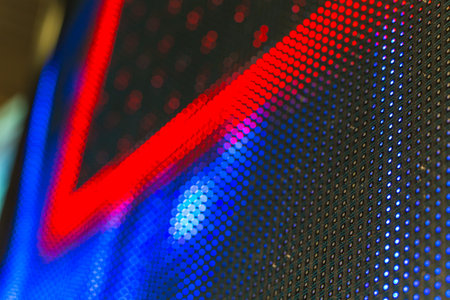 Bright colored LED video wall with high saturated pattern - close up background with shallow depth...