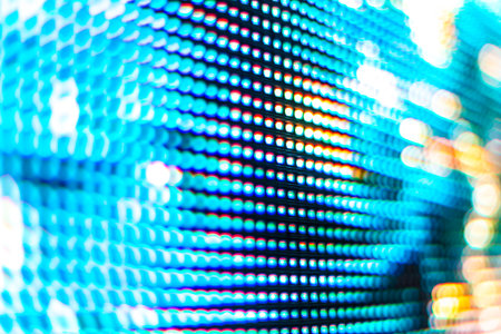 Bright colored LED video wall with high saturated pattern - close up background with shallow depth of fieldの写真素材