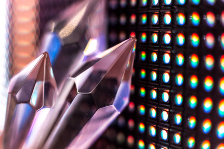 Bright colored stone crystals on the LED wall background  - close-up macro photo