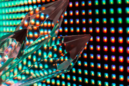 Bright colored stone crystals on the LED wall background  - close-up macro photoの写真素材