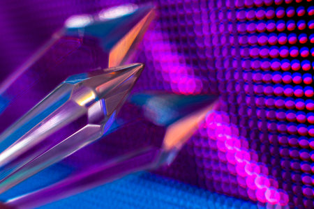 Bright colored stone crystals on the LED wall background  - close-up macro photoの写真素材