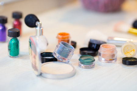 Different makeup items on the table - product photo with shallow depth of field.の写真素材