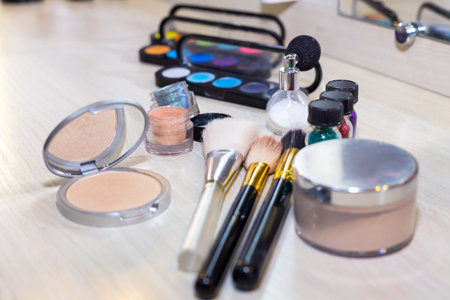 Different makeup items on the table - product photo with shallow depth of field.の写真素材