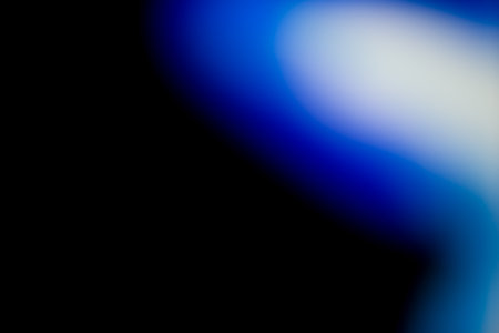 Abstract light flares on the black background for designers and retouch to apply in screen regime to compose the picture. の写真素材