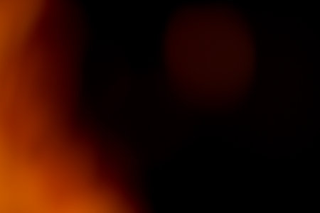 Abstract light flares on the black background for designers and retouch to apply in screen regime to compose the picture. の写真素材