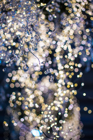 Abstract unfocused backgrounds with Christmas decorations with led light bokeh - close-up photo.