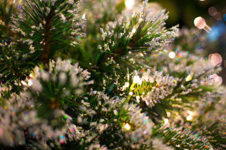 Abstract unfocused backgrounds with Christmas decorations with led light bokeh - close-up photo.