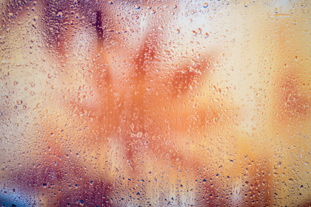 Rain drops on the window - abstract background. Close up photo.
