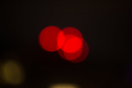 Abstract light flares on the black background for designers and retouch to apply in screen regime to compose the picture.の写真素材