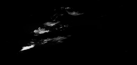 Real clouds and sky hi-res texture for design and retouch - abstract photo texture of the real clouds on the black background for adding and editing as a background layer in the Screen blending modeの写真素材