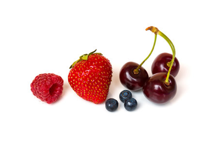 Strawberry, cherry, raspberry and blueberry isolated on white backgroundの写真素材