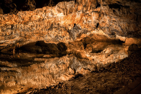 Baradle Cave in Aggtelek National Park in Hungury. Stalactite and stalagmite inside a caveの写真素材