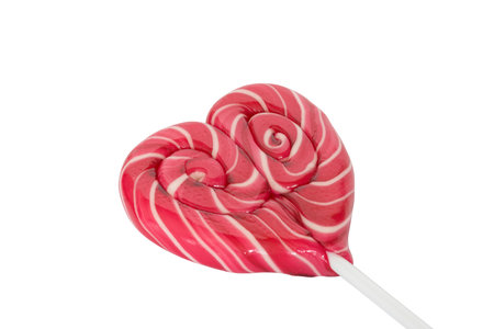Christmas sugar candy cones heart shaped isolated on white backgroundの写真素材