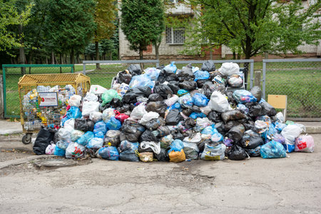 Lviv, Ukraine - September 13, 2016: Dumpsters being full with garbageのeditorial素材