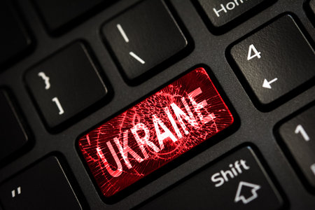 Message on broken red enter key of keyboard. Computer Ukraine war attack warning. copyspace.の写真素材