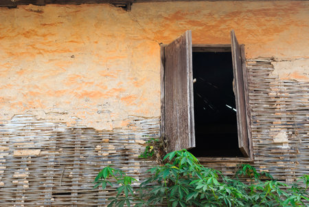 Wood windows on the wall form Weave. Weave a wall.の写真素材