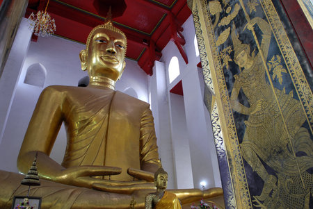 Big statue image of buddha meditation. Thai traditional painting.の写真素材