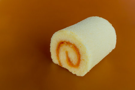 sweet cakes on the orange backgroundの写真素材