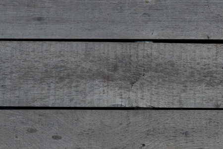 old wooden surface with scratches . texture for design. old wood texture backgroundの写真素材