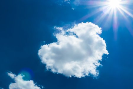 Clouds are forming with have sunlight on the blue sky,For decoration in the design holiday backgroundの写真素材