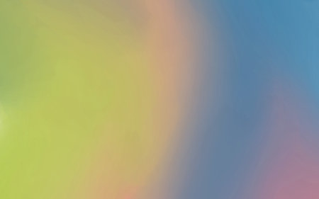 A blurred gradient background transitions smoothly from green to blue with hints of pink and yellow.の写真素材