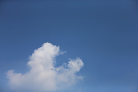 blue sky with white cloudsの写真素材