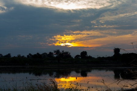 sunset over lakeの写真素材