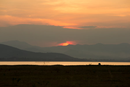 sunset over lakeの写真素材