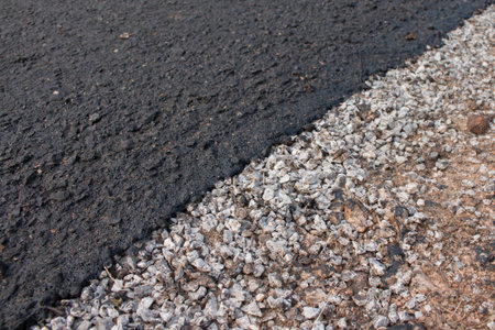 Close-up asphalt at the road under construction.