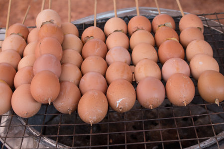 Grilled eggs at street food in Thailandの写真素材