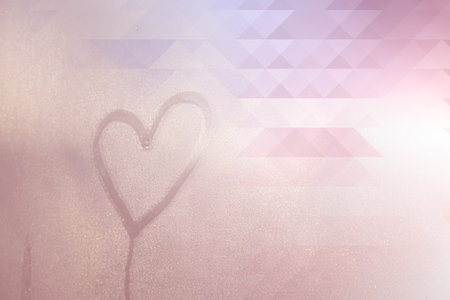 Heart shape on glass window with waterdrop concept design for valentine's day background or wedding background.の写真素材